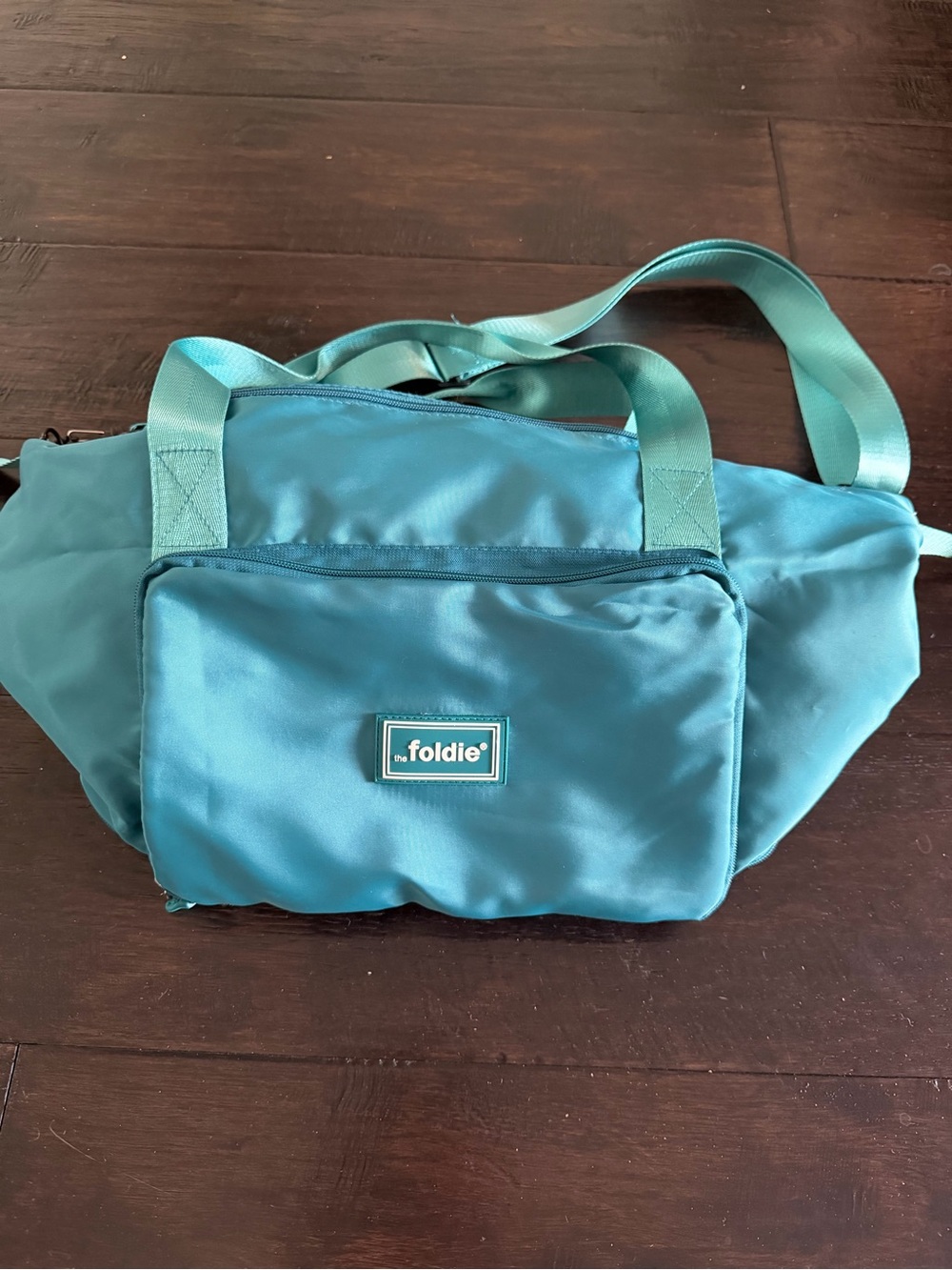 The Foldie Teal Travel Crossbody Bag